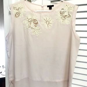 Soft pink sleeveless Ann Taylor dress shirt.